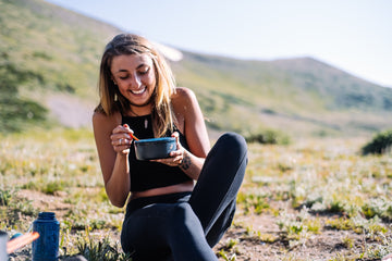 woman eating her food after working out